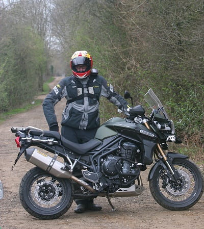 He looks proud. But he's been riding about on a new Triumph Tiger Explorer XC, so wouldn't you look excited like Potter?