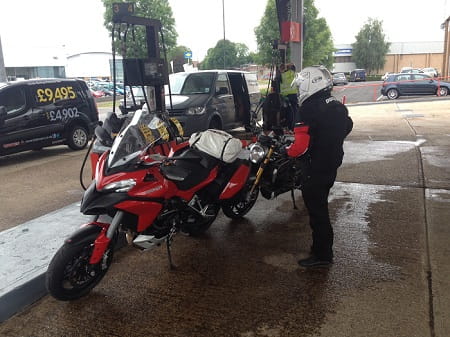 The Multistrada and the Monster, and Ducati UK's Tim Maccabee. The Monster actually did 159 miles on a tank at one point.