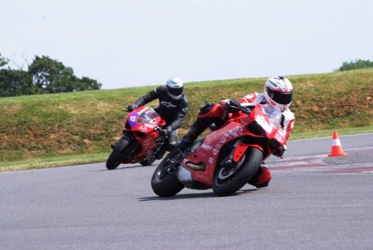 Instructors lead the way around Silverstone's Stowe circuit
