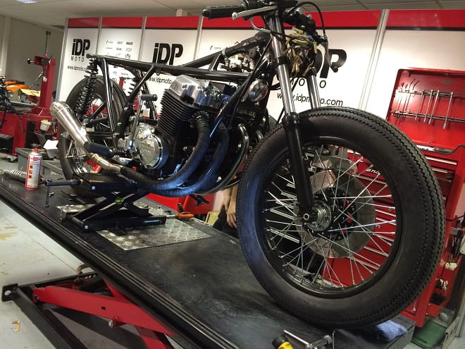 Nearly there. Oil lines to go on, exhausts in place. Our dream of a Honda CB750 gets closer.