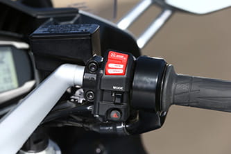 Rocker style ignition, riding modes and hazards on the right