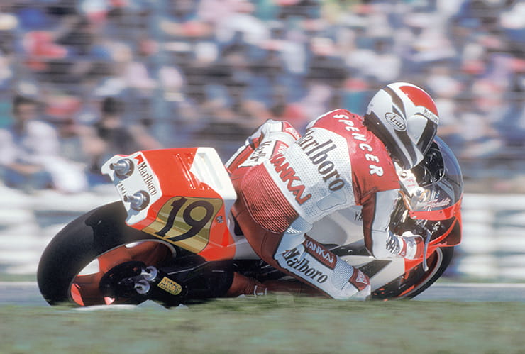 Freddie Spencer races through a corner on a 500cc two-stroke MotoGP bike