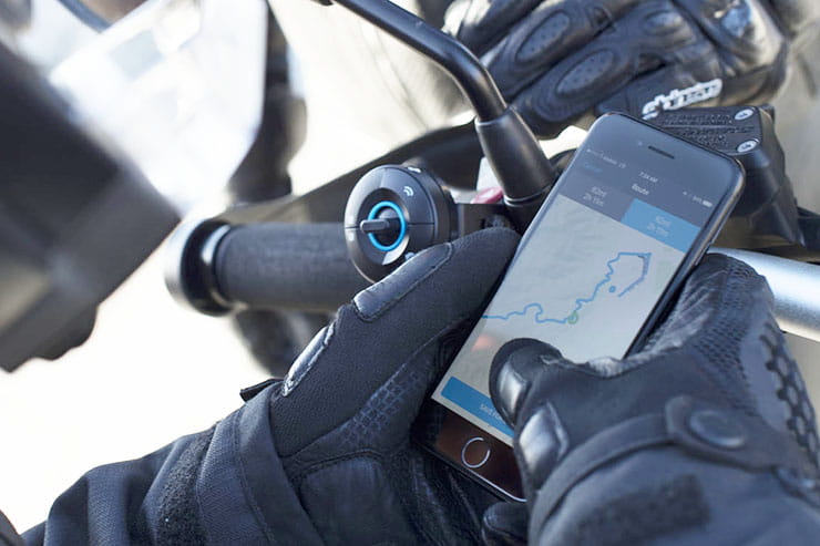 A rider using the NuViz system logs into the app on their phone