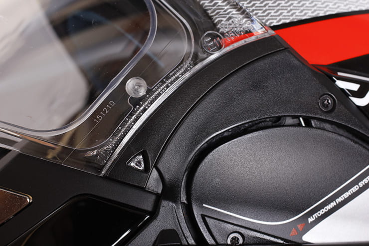 Evo-One motorcycle helmet visor opening mechanism