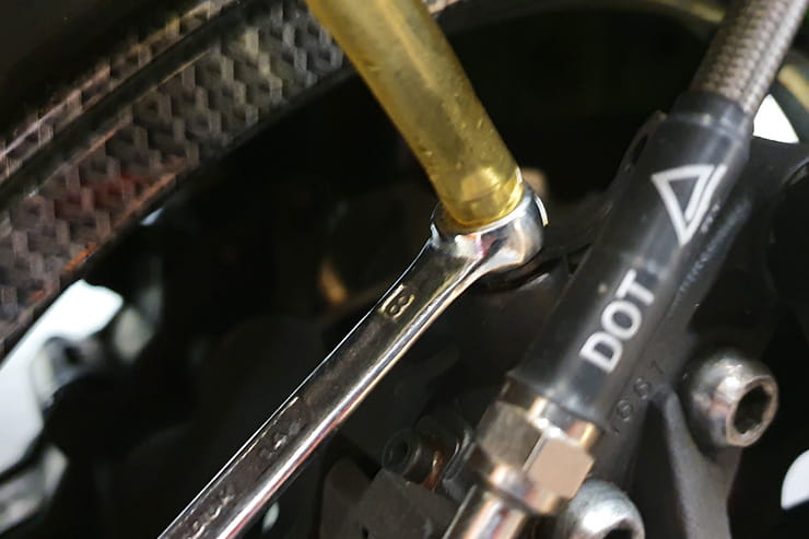 It’s important to change your brake fluid regularly, so understanding how to bleed brakes is vital. Here we’ll also show you how to fit new braided lines…