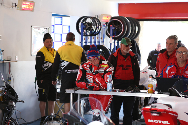 John McGuinness contemplates in the pit garage