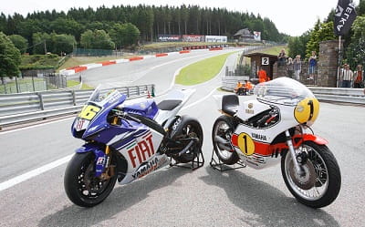 Old vs new. Classic racer lines up against modern day Yamaha M1 MotoGP bike at Assen