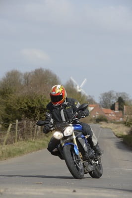 Triumph's Street Triple, a windmill, and the A149. Great days, great bike. Grab a test ride if you can.