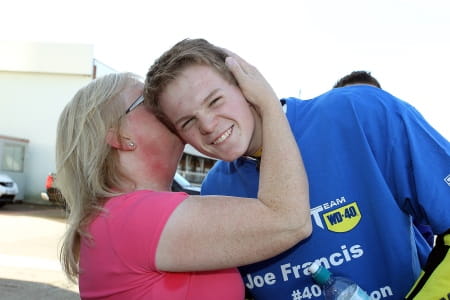 Joe's mum kisses him well done