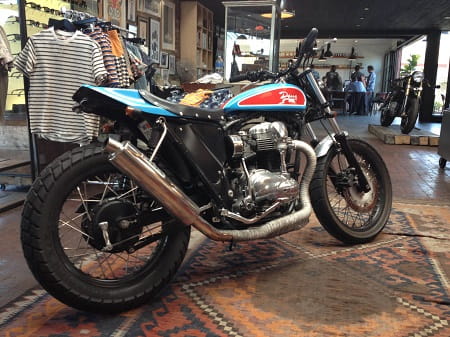 W650-based street tracker is called Street Tracker STP with a colour scheme based on a NASCAR. It features a street tracker seat unit and tank, plus pipe wrapping and a full race exhaust system.