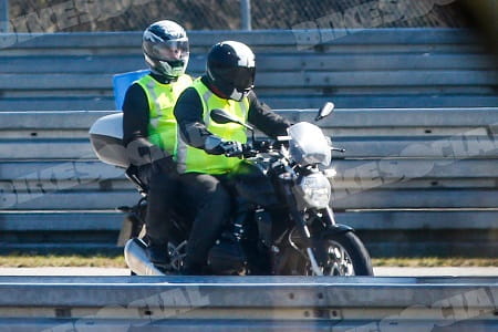 BMW's R1200R spied on test. We reckon the pillion is looking straight at the photographer, what do you think?