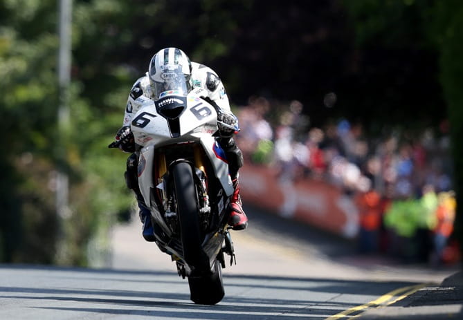 Mr Dunlop gives it full gas over Ago's Leap at the 2014 TT