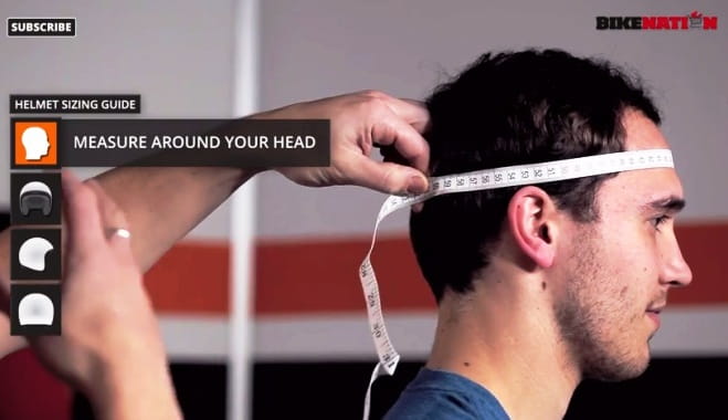 Put a tape measure around the largest part of your head