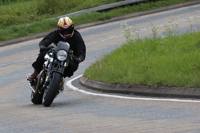 Head down, on the pipe. Norton Dominator SS Number One attempts to wake up Leicestershire.