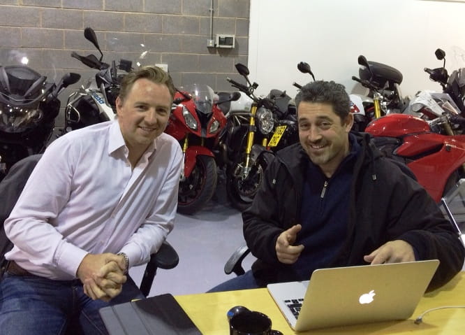 Zef Eisenberg (right) show Bike Social's Michael Mann the onboard footage from the speed run