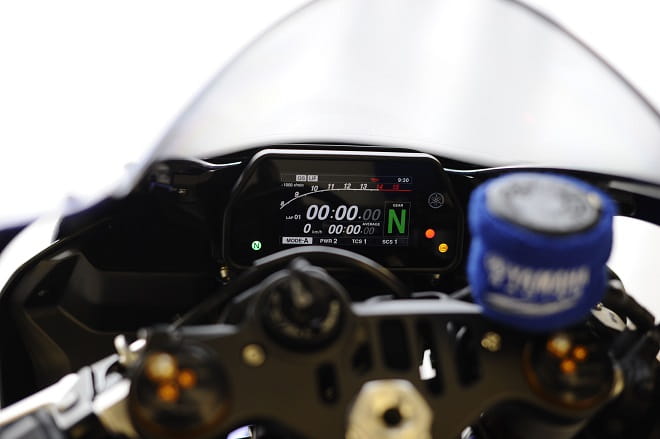 R1 clocks start at 8000rpm. Yamaha Racing wrist band to stop any brake fluid leaks is just like Valentino's bike.