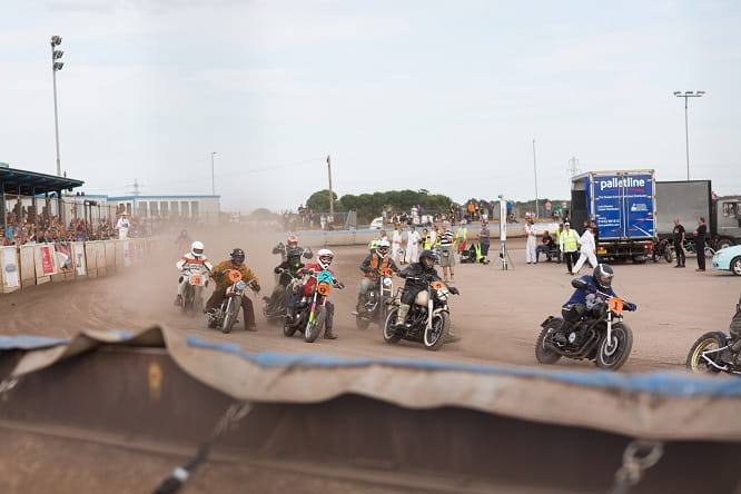 Competitors in the Chopper Final pile into the first corner