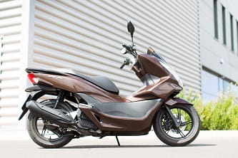 PCX's 8 litre tank is 1.4 larger than than the Yamaha