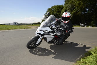 Tour the word then sling it around a road race track - multi purpose Multistrada