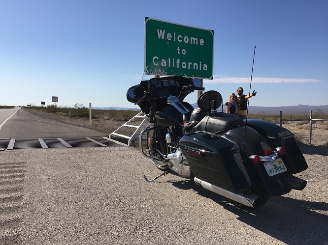 It's hot as we ride into California