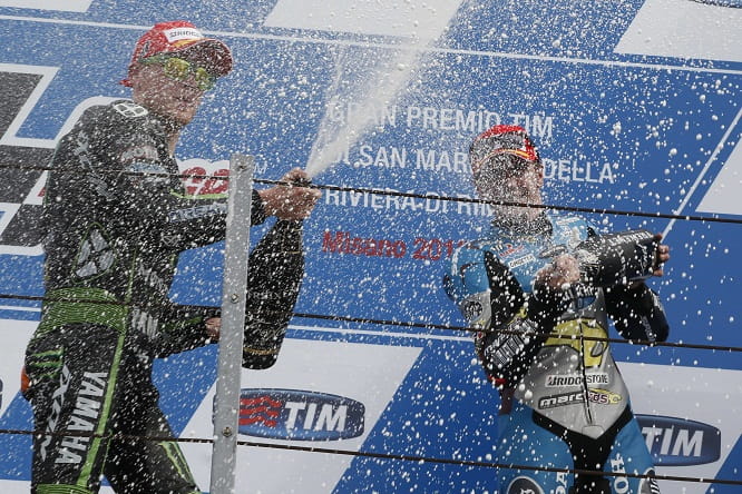 Redding celebrates with second placed Bradley Smith, the first time two Brits had been on the podium since 1979