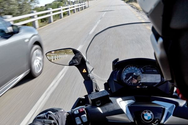 Flashing signal alerts rider to vehicles in their blind spot