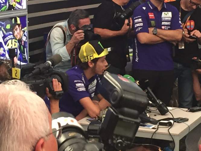 Valentino Rossi talks to the press ahead of the Valencia Grand Prix