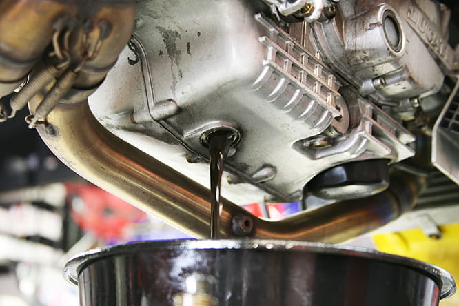 Drain and refill the engine with the recommended oil from the owner's maual