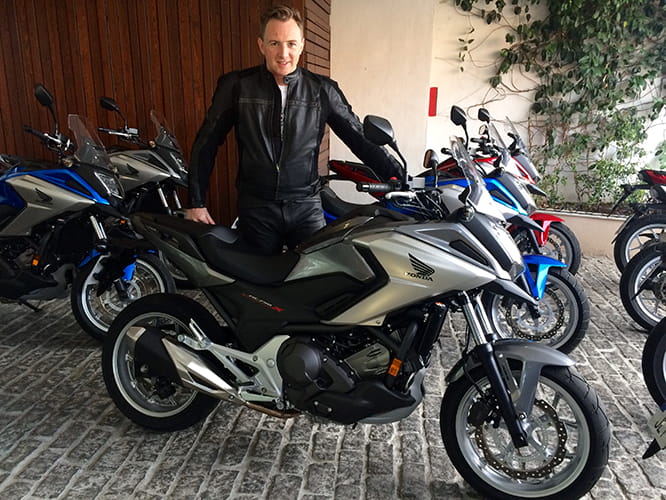 Honda's NC750X with a clean new look, Michael looks like he's had a shave too.