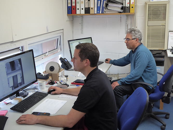 Chief Engineer Mike Wilson (furthest from camera) and Design Engineer Chris Papworth are the technical powerhouse of Dymag. Mike invented the first all-carbon motorcycle wheel in 1995.