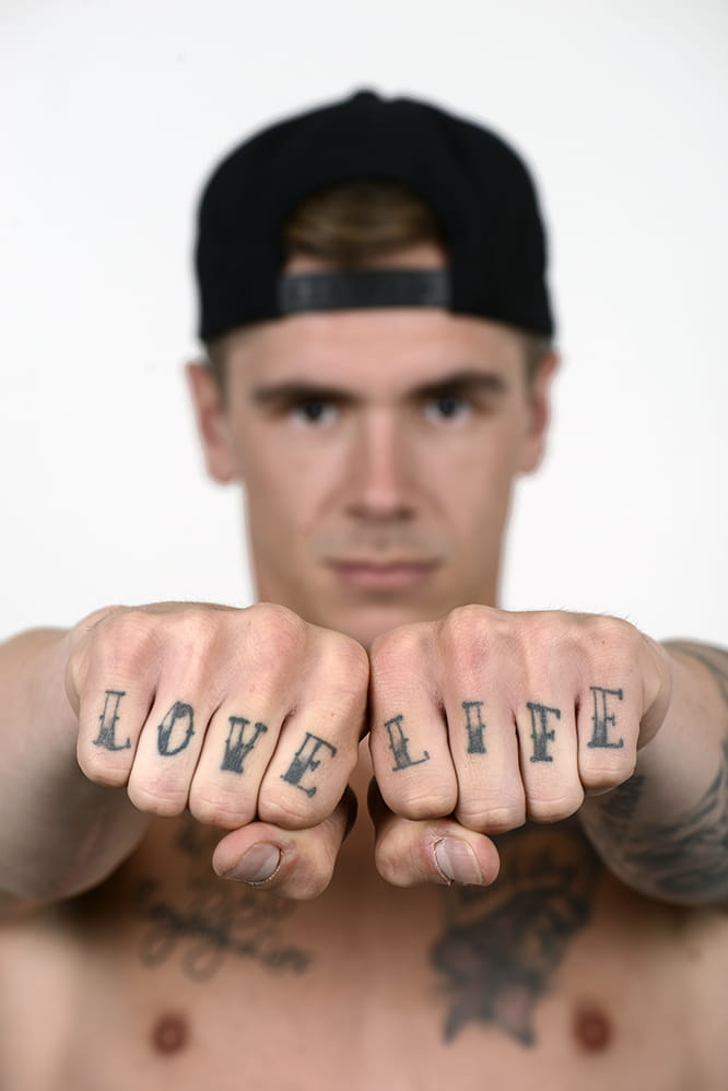 Redding's tattooed knuckles, the most painful of the lot.